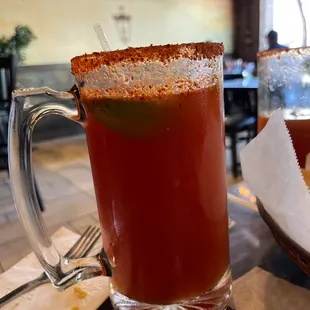 a glass of bloody drink