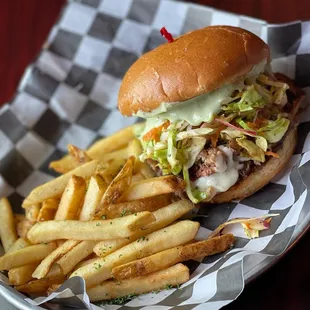 Pulled pork sandwich with jalapeño lime coleslaw.