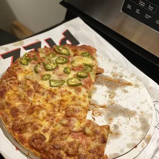 All sausage and pepperoni 1/2 fresh jalapeños.. delicious