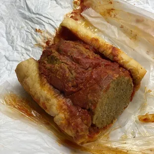 Meatball sandwich on garlic bread!! That&apos;s half of it. 3 huge meatballs. About a 9&quot; sandwhich!!