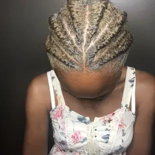 Flat twist set on natural hair . Custom coloring on curly hair