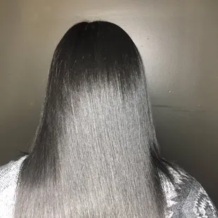Shine enhancement treatment with Silk Press on natural hair