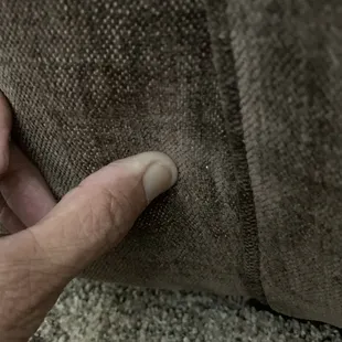 Bottom chair again a stapler sticking out