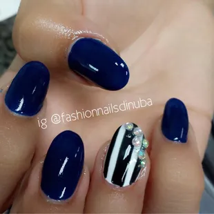 Got these done in October and the little jewels stayed on the entire time. Well until I got my refill.