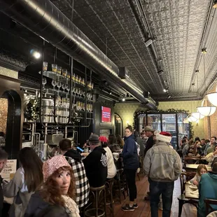 a crowd of people sitting at tables