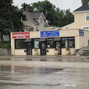 Easy to miss. Two parking spaces out front.