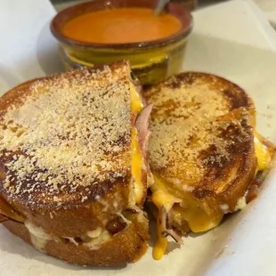 Whole hog sandwich with Tomato buisqe.