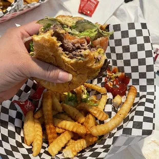 Double cheeseburger with a side of crinkle-cut fries