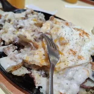 This is the country fried chicken skillet. It was amazing, sorry we dug into it before taking pictures lol.