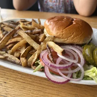 a burger and fries on a plate