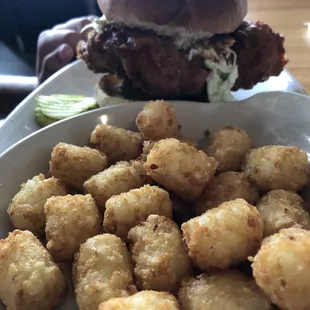 Tots with fried chicken sandwich
