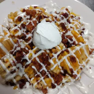 Idaho Nacho&apos;s (waffle fries, shredded cheese, crumbled bacon, ranch sauce)