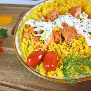Marinated Chicken Shawarma with tzatziki sauce made from scratch and turmeric rice