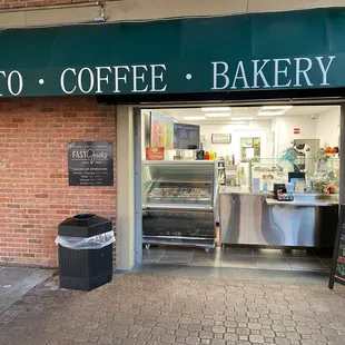 the entrance to a delecto coffee bakery