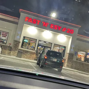  car parked in front of a fast food restaurant