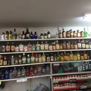 shelves full of alcohol bottles