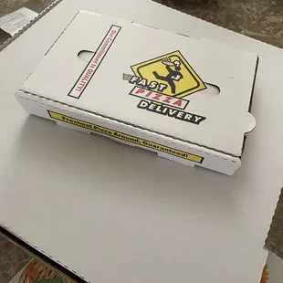 a box of pizza on a table