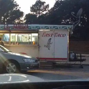 a food truck parked in a parking lot