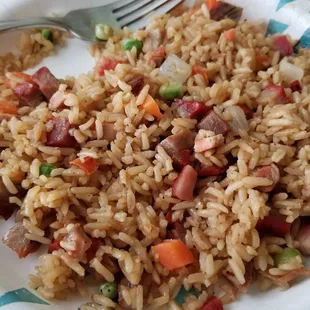 a plate of rice and vegetables