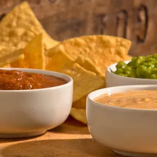 two bowls of salsa and tortillas