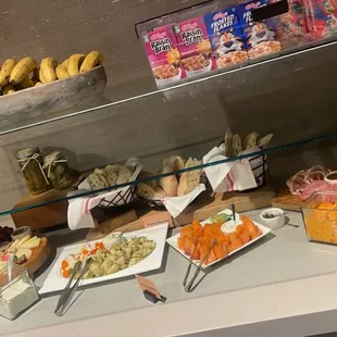 a variety of food displayed on a counter