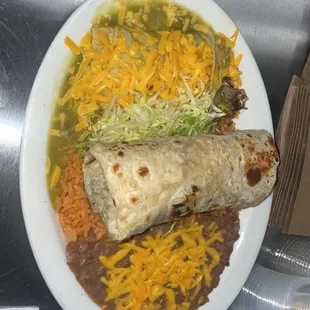 Combination plate # meat burrito with green or red enchilada , on side has rice &amp; beans &amp; 16 oz drink