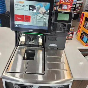 a cash register with a tablet on top