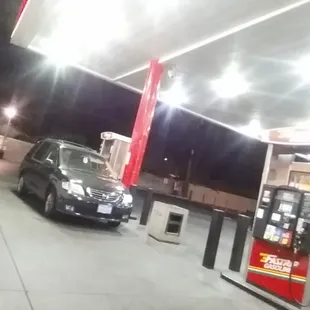 a car parked at a gas station