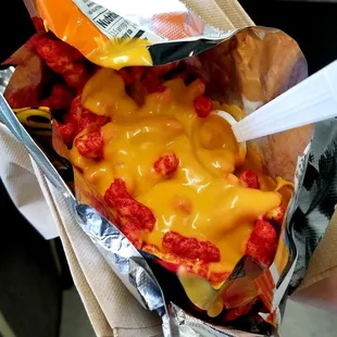 Hot cheetos with cheese..