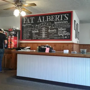 a man standing at the counter