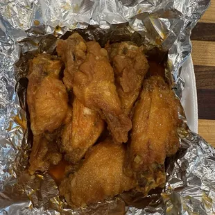 1/2 dozen bone in wings w/ hot butter &amp; garlic.