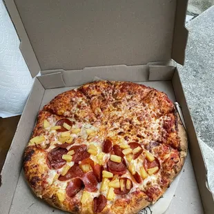 Half cheese, half pepperoni on pineapple. THIN(?) crust?