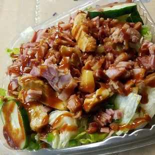 a salad in a plastic container
