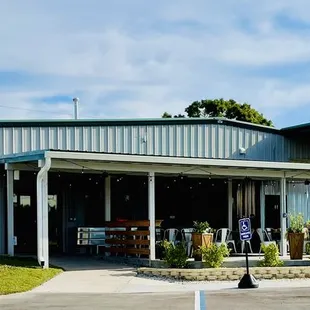 Back porch seating area with water reservoir.