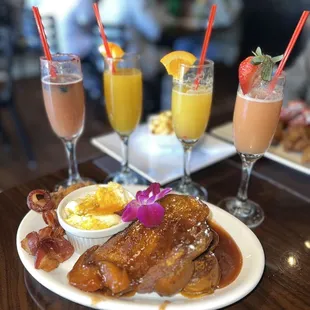 Blueberry Mimosa, Mango Mimosa, Peach Mimosa, Strawberry Mimosa Peach Cobbler French Toast &amp; Eggs with a side of bacon, Mac and Cheese