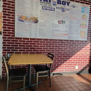 a table and chairs in a restaurant