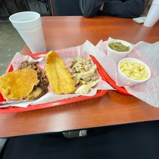 3 meat plate with cat fish brisket and chicken with Mac and cheese and green beans