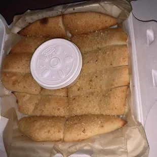 a sandwich in a styrofoam container