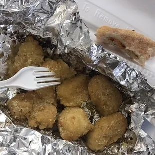 Soggy frozen chicken nuggets with barely any sauce...