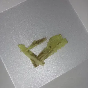 a piece of broccoli in a box