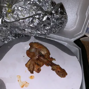 Half eaten wing that was delivered