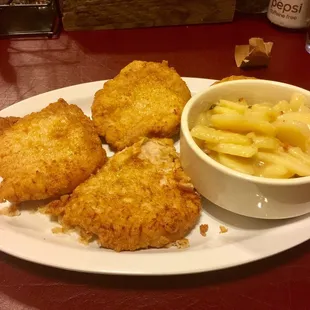a plate of food with macaroni and cheese