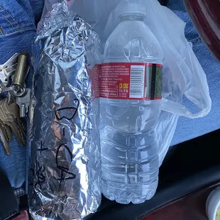 Size of the carne asada burrito next to my water bottle