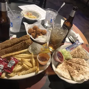catfish and fries, chicken quesadilla and breaded mushrooms.