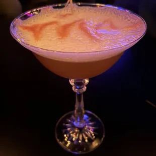 Proper whiskey sour with egg whites and bitters