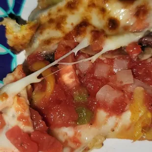 two slices of pizza on a plate