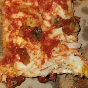 a slice missing from the pizza