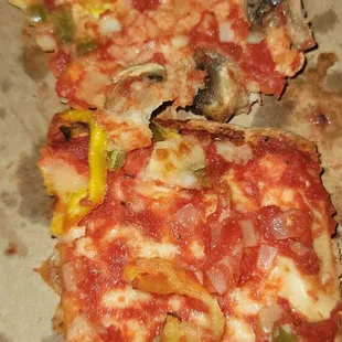 a slice of pizza in a box