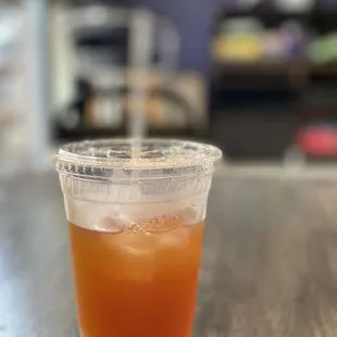 a plastic cup of iced tea