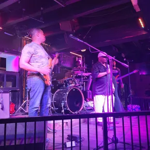 a band playing on stage